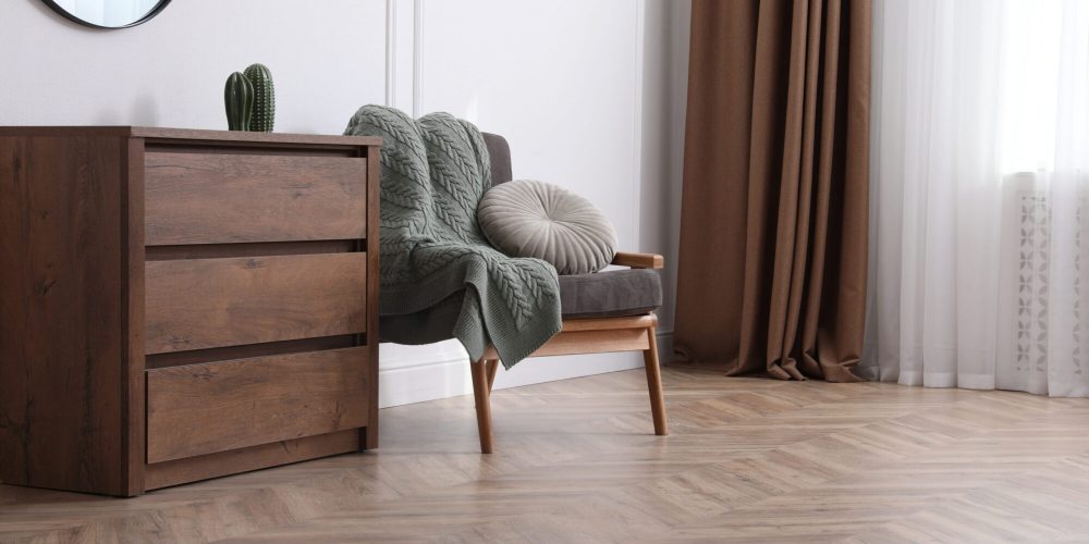 Modern living room with parquet flooring and stylish furniture